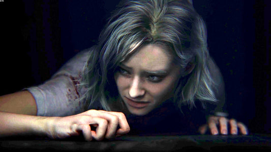 A woman is lying on the ground looking scared