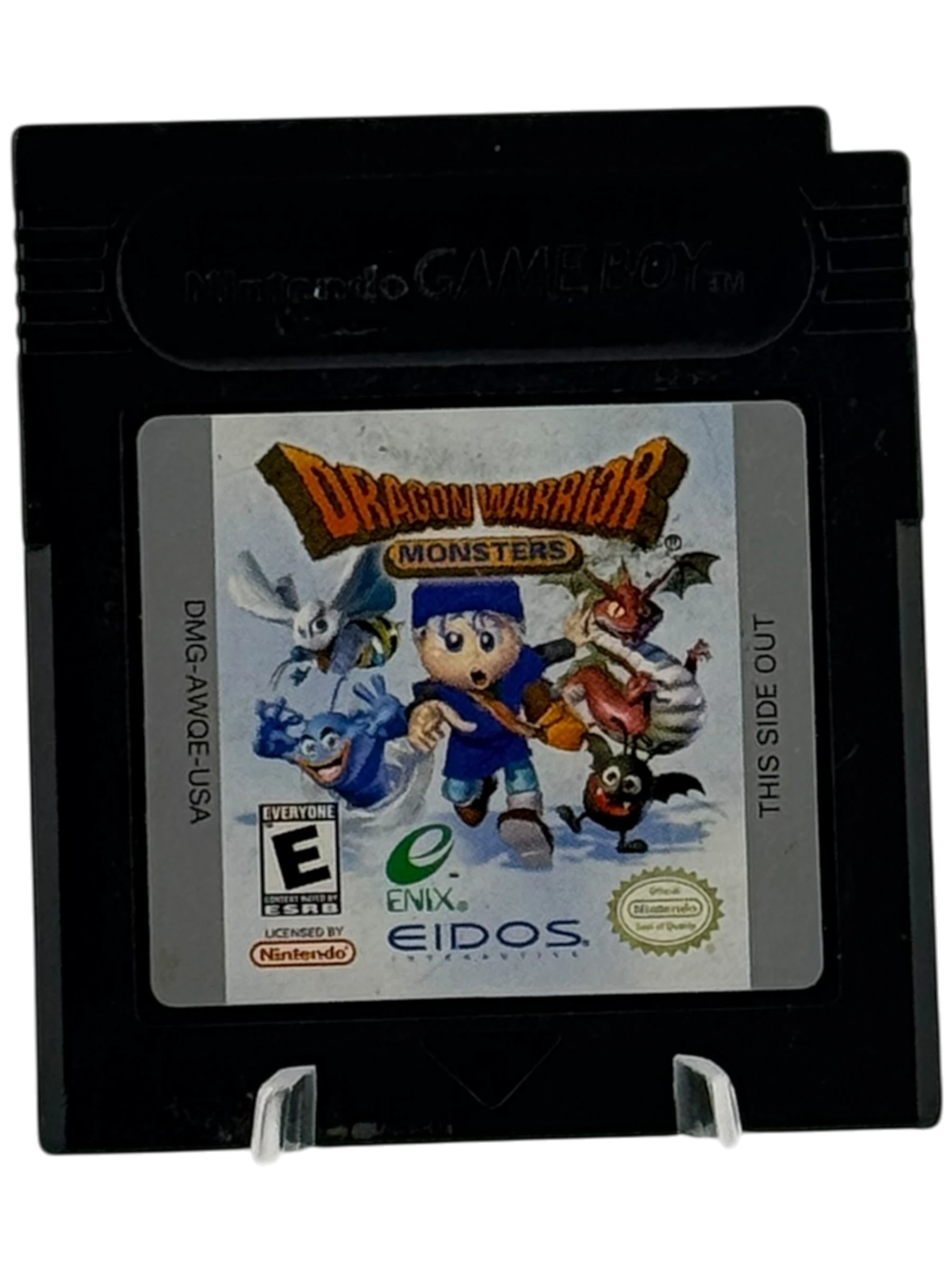 Coolection Dragon Warrior Monsters Game Boy Color cartridge featuring a boy with blue hair and various monsters. ESRB E rating.