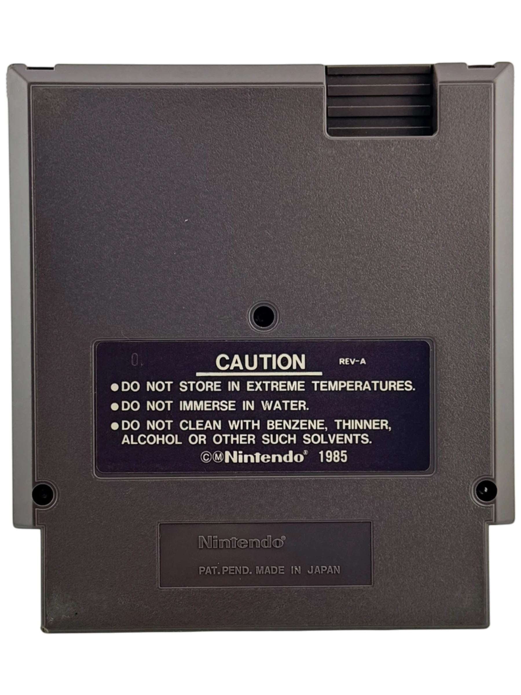 Coolection WWF WrestleMania NES game cartridge, grey plastic with caution label and Nintendo branding.
